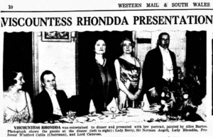Newspaper photograph showing dinner party guests